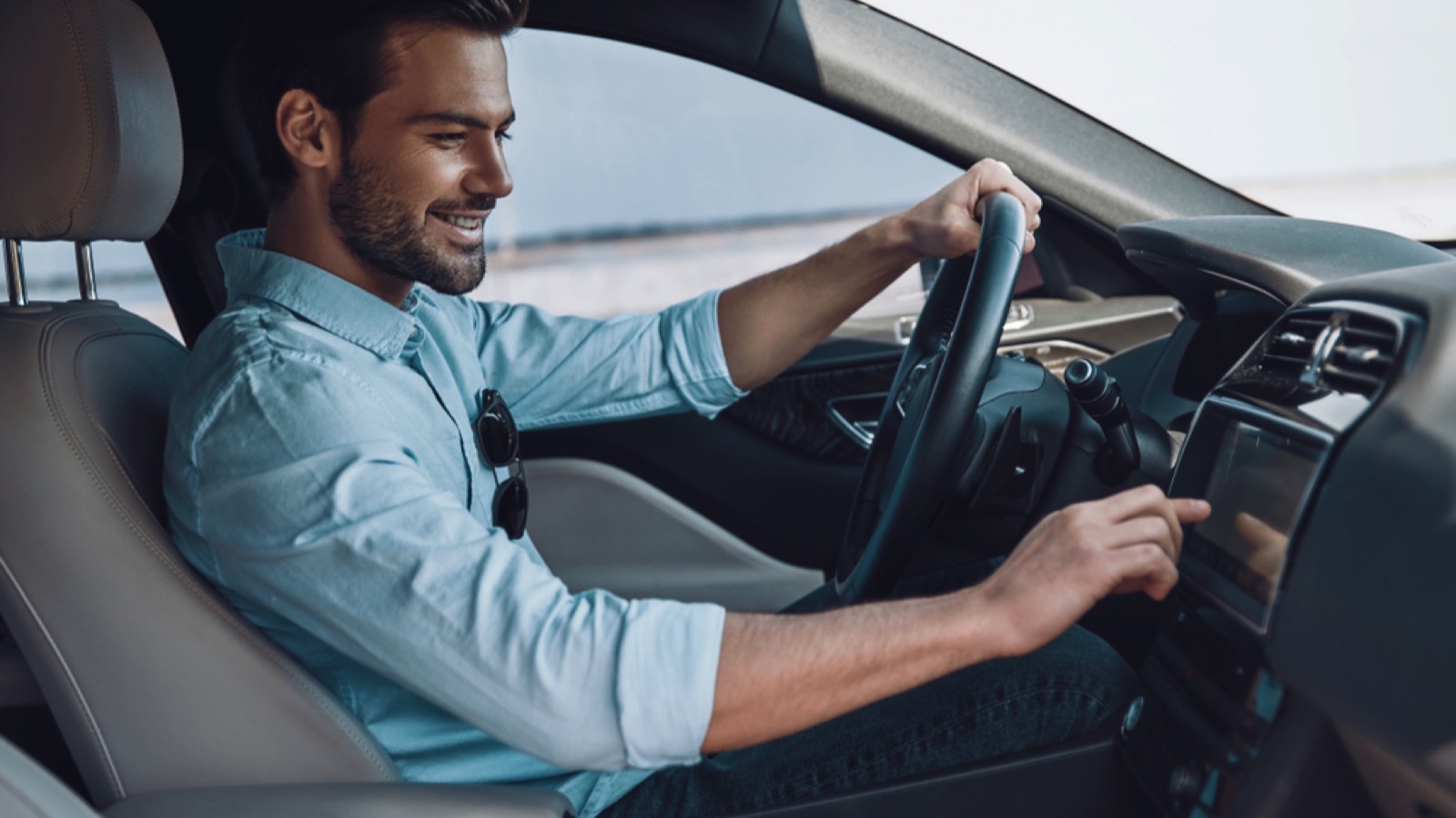 Man driving and listening to music