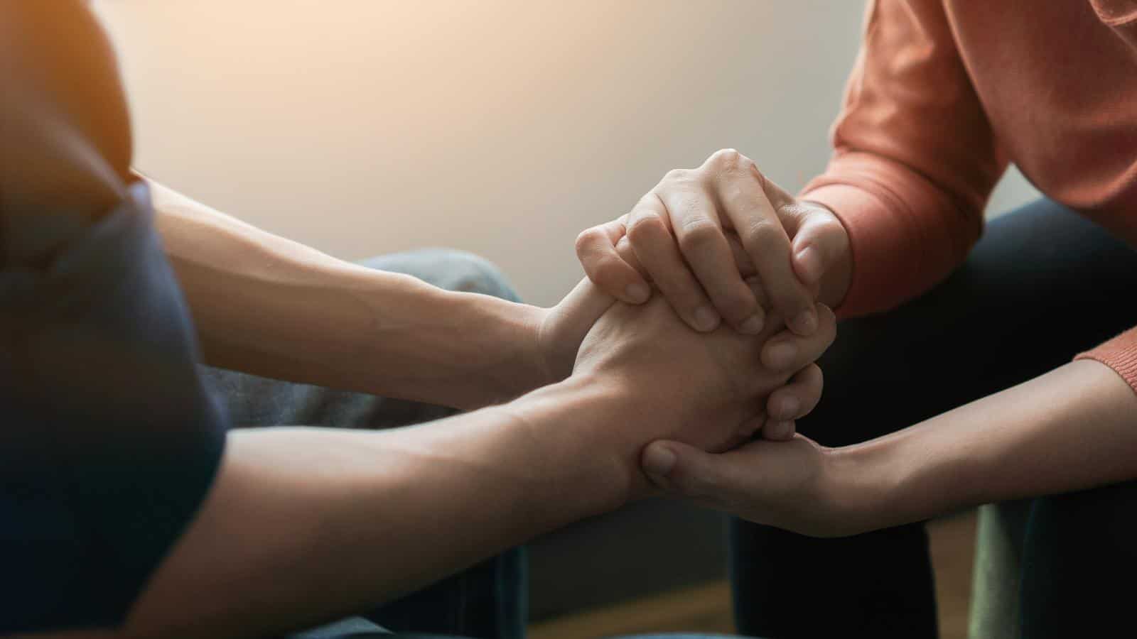 Mental Illness hands couple calm